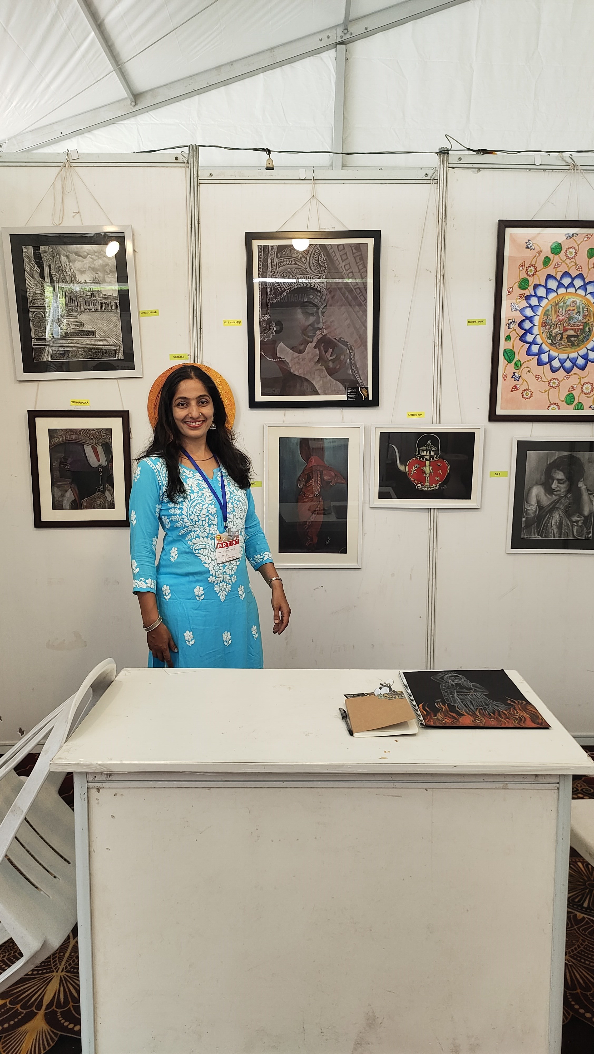 Vibhuti Mehta with her artworks at an exhibition